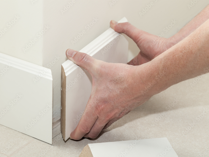 Person installing Trim